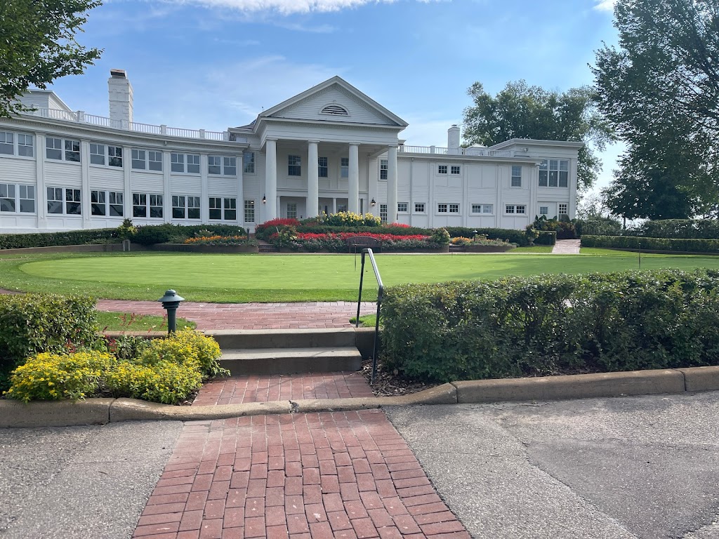 Panoramic view of a lush green golf course at The Minikahda Club. Smooth