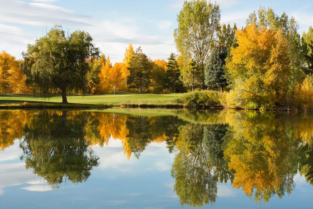 Panoramic view of a lush green golf course at The Oaks at Spanish Fork. Smooth