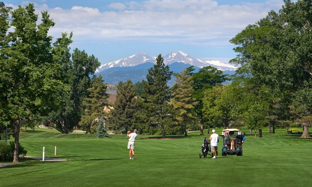 Panoramic view of a lush green golf course at The Olde Course at Loveland. Smooth