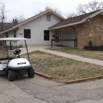 Panoramic view of a lush green golf course at The Orchards Executive Golf Course. Smooth