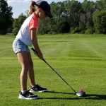 Panoramic view of a lush green golf course at The Players Club at Woodland Trails. Smooth