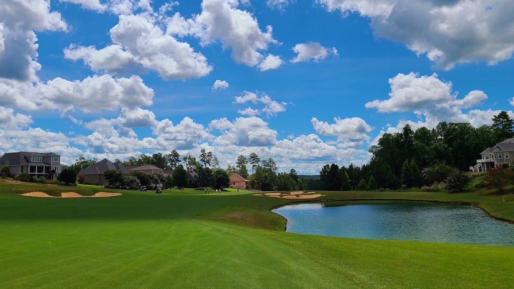 Panoramic view of a lush green golf course at The Reserve Club At Woodside. Smooth