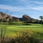 Panoramic view of a lush green golf course at The Short Course at Mountain Shadows. Smooth