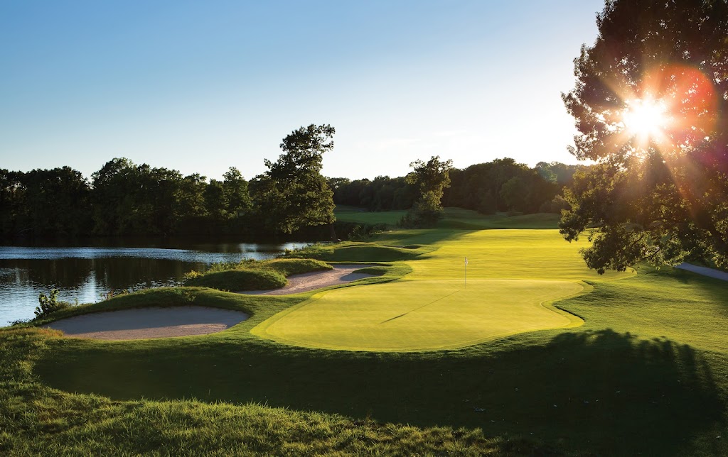 Panoramic view of a lush green golf course at Thornapple Pointe Golf Club. Smooth