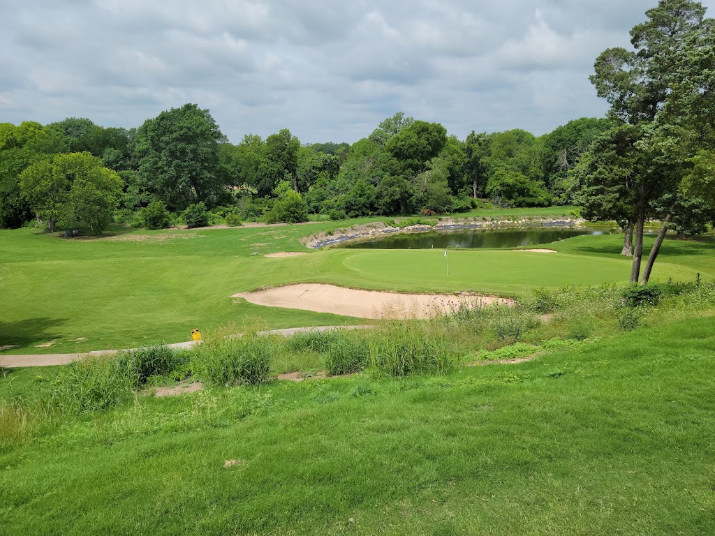 Panoramic view of a lush green golf course at Thorntree Golf Club. Smooth