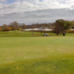 Panoramic view of a lush green golf course at Thunderbird Hills Golf Course / Bar North - Huron. Smooth