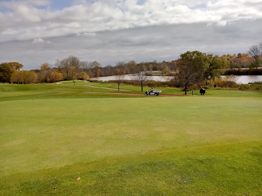 Panoramic view of a lush green golf course at Thunderbird Hills Golf Course / Bar North - Huron. Smooth