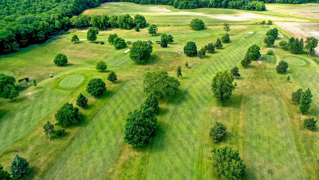 Panoramic view of a lush green golf course at Timber Ridge Golf Club. Smooth