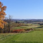 Panoramic view of a lush green golf course at Totteridge Golf Club. Smooth