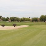 Panoramic view of a lush green golf course at Trail Ridge Golf Course. Smooth