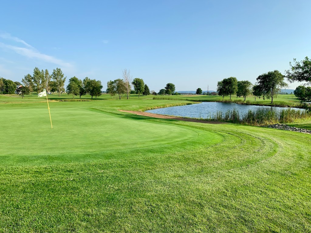 Panoramic view of a lush green golf course at Trempealeau Mountain Golf Club. Smooth