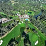 Panoramic view of a lush green golf course at Tualatin Country Club. Smooth