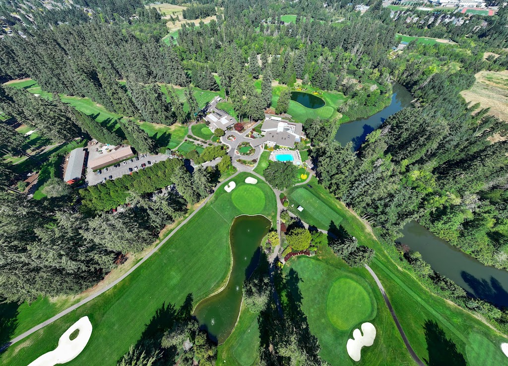 Panoramic view of a lush green golf course at Tualatin Country Club. Smooth