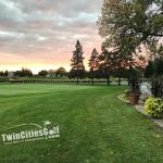 Panoramic view of a lush green golf course at TwinCitiesGolf.com. Smooth