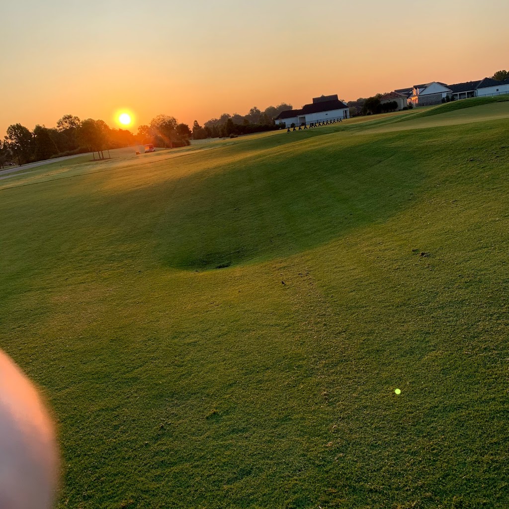 Panoramic view of a lush green golf course at University Club Clubhouse. Smooth