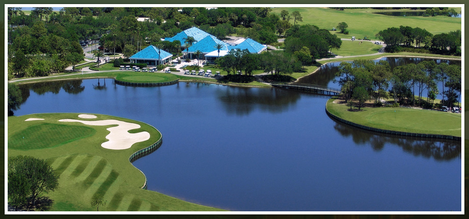 Panoramic view of a lush green golf course at University Park Country Club. Smooth