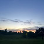 Panoramic view of a lush green golf course at Valley View Golf Course. Smooth