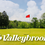 Panoramic view of a lush green golf course at Valleybrook Golf and Country Club. Smooth