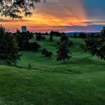 Panoramic view of a lush green golf course at Vandal Golf Course at the University of Idaho. Smooth