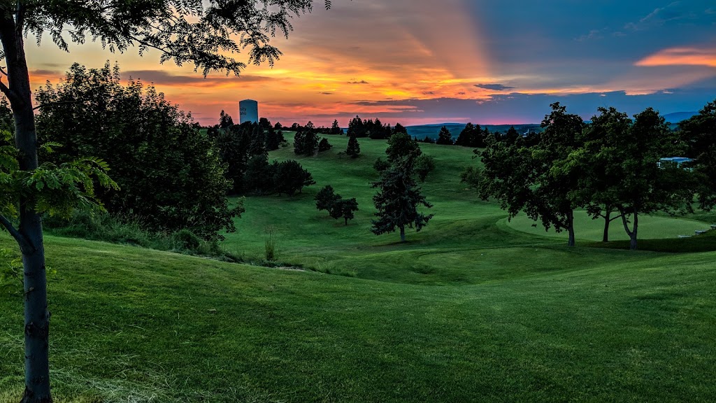 Panoramic view of a lush green golf course at Vandal Golf Course at the University of Idaho. Smooth