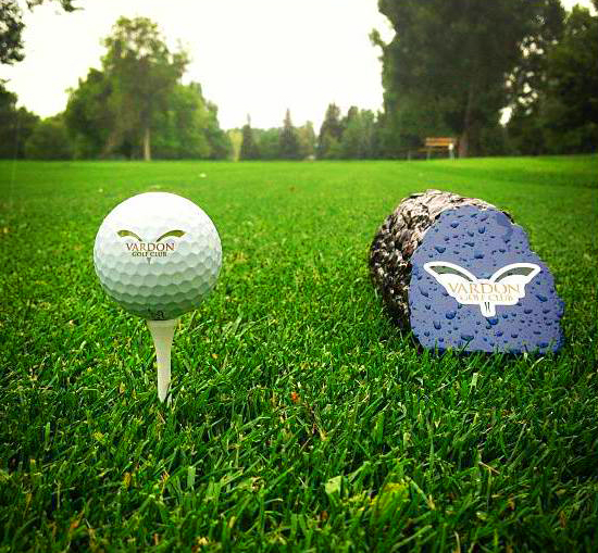 Panoramic view of a lush green golf course at Vardon Golf Club. Smooth