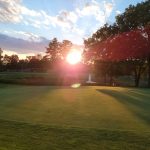 Panoramic view of a lush green golf course at Veterans Memorial Golf Course. Smooth