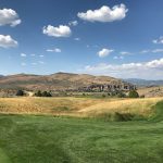 Panoramic view of a lush green golf course at Victory Ranch. Smooth