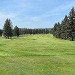 Panoramic view of a lush green golf course at Virginia Golf Course. Smooth