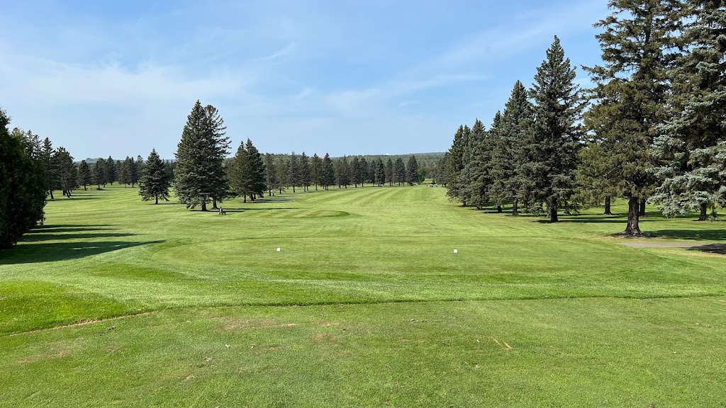 Panoramic view of a lush green golf course at Virginia Golf Course. Smooth