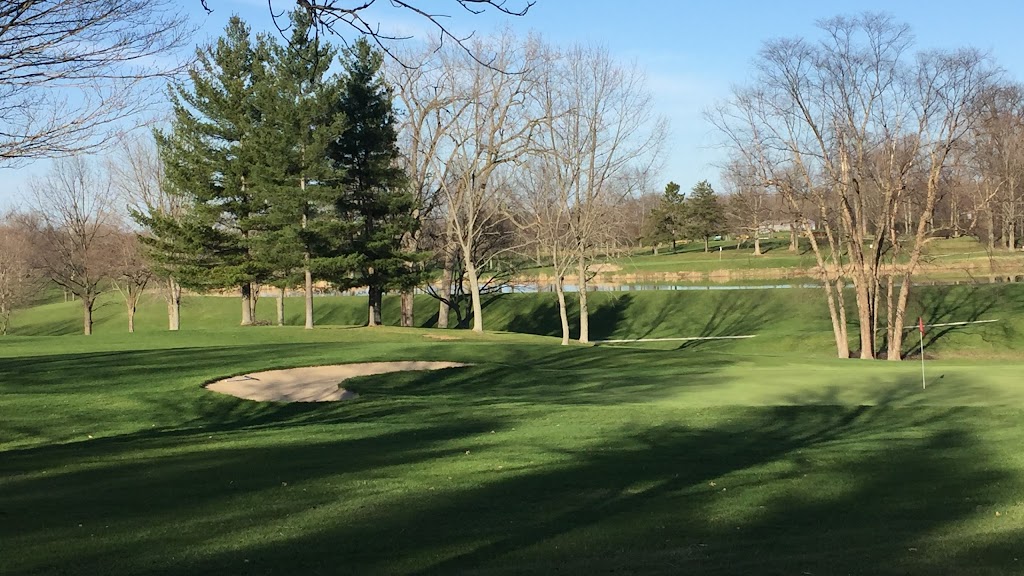 Panoramic view of a lush green golf course at Walnut Creek Golf Courses. Smooth