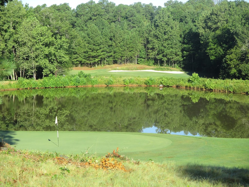 Panoramic view of a lush green golf course at Waterford Golf Club Llc. Smooth