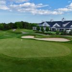 Panoramic view of a lush green golf course at Waverly Oaks Golf Club. Smooth