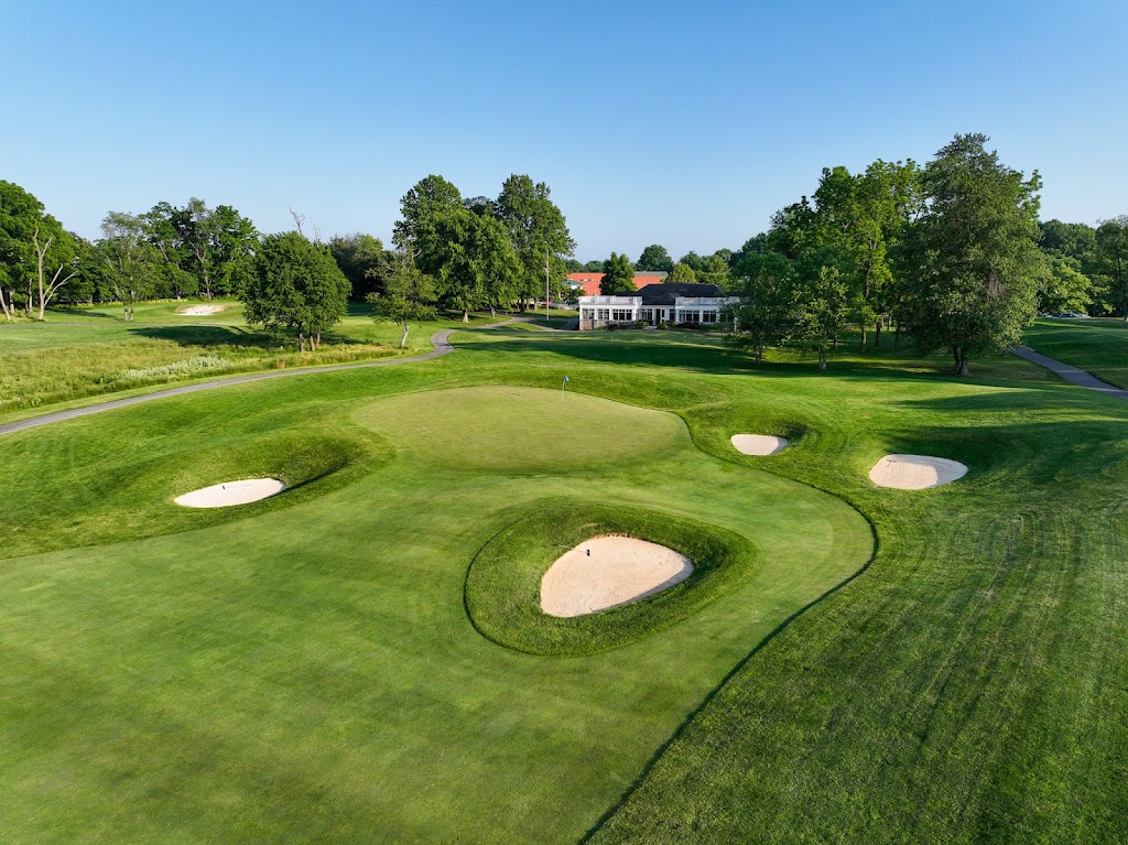 Panoramic view of a lush green golf course at Waverly Woods Golf Club. Smooth