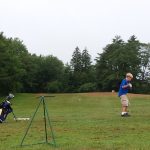 Panoramic view of a lush green golf course at Wawenock Golf Club. Smooth