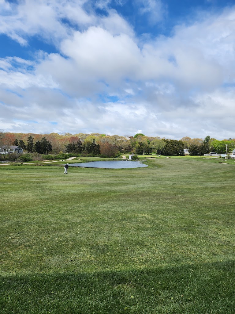 Panoramic view of a lush green golf course at Weekapaug Golf Course. Smooth