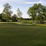 Panoramic view of a lush green golf course at Western Hills Golf Club - GreatLIFE Golf & Fitness. Smooth