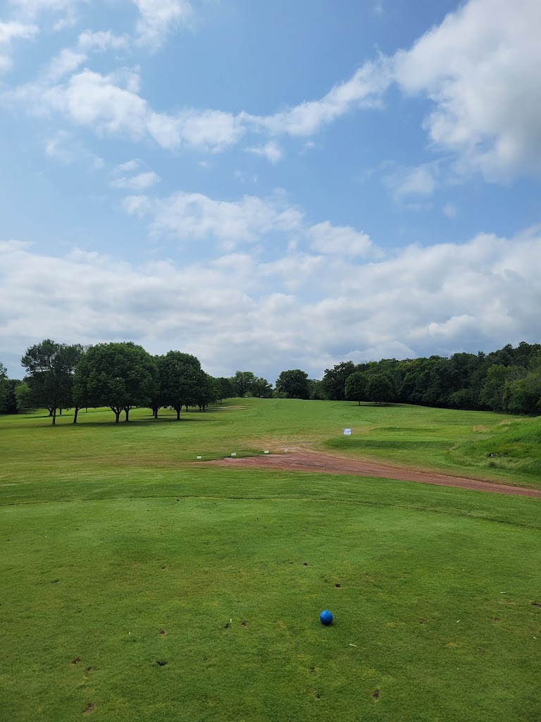 Panoramic view of a lush green golf course at Western Lakes Golf Club & Event Venue. Smooth