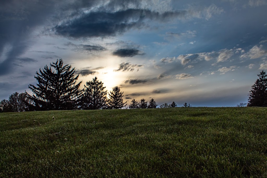 Panoramic view of a lush green golf course at Westover Golf Club. Smooth