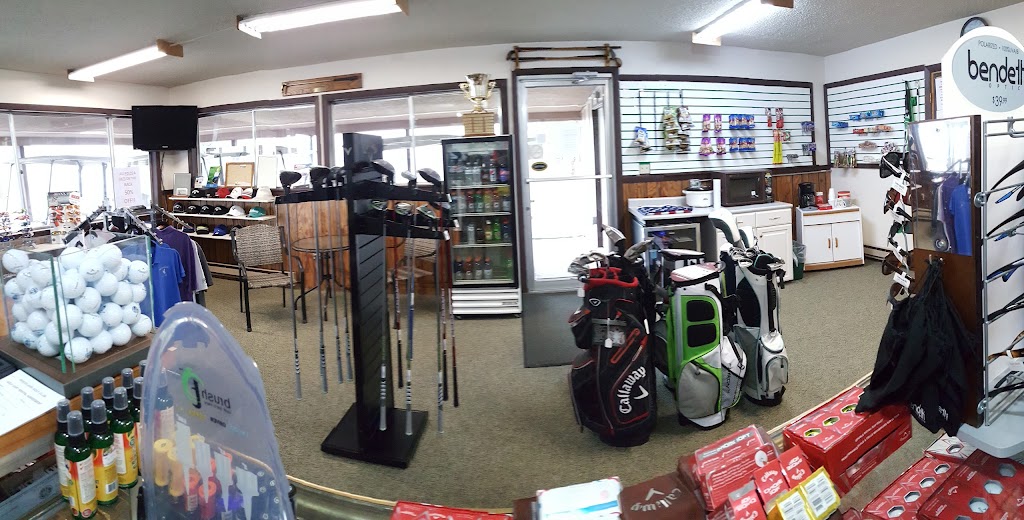 Panoramic view of a lush green golf course at Wheatland Golf Club. Smooth