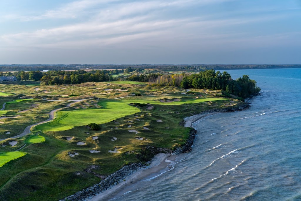 Panoramic view of a lush green golf course at Whistling Straits Golf Course. Smooth