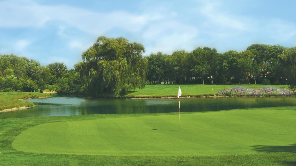 Panoramic view of a lush green golf course at White Pines Golf Club. Smooth