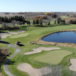 Panoramic view of a lush green golf course at Willinger's Golf Club. Smooth