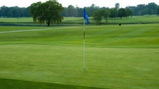 Panoramic view of a lush green golf course at WillowBrook Golf Club. Smooth