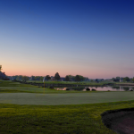 Panoramic view of a lush green golf course at Willowbend Golf Club. Smooth