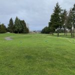 Panoramic view of a lush green golf course at Willows Run Golf Complex. Smooth