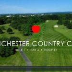 Panoramic view of a lush green golf course at Winchester Country Club. Smooth