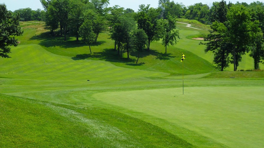 Panoramic view of a lush green golf course at WinterStone Golf Course. Smooth