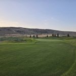 Panoramic view of a lush green golf course at Wohali. Smooth