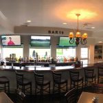 Panoramic view of a lush green golf course at Worthington Manor Golf Club. Smooth