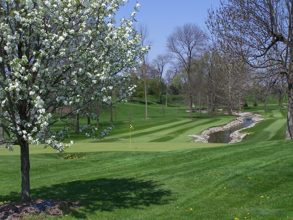 Panoramic view of a lush green golf course at Woussickett Golf Course